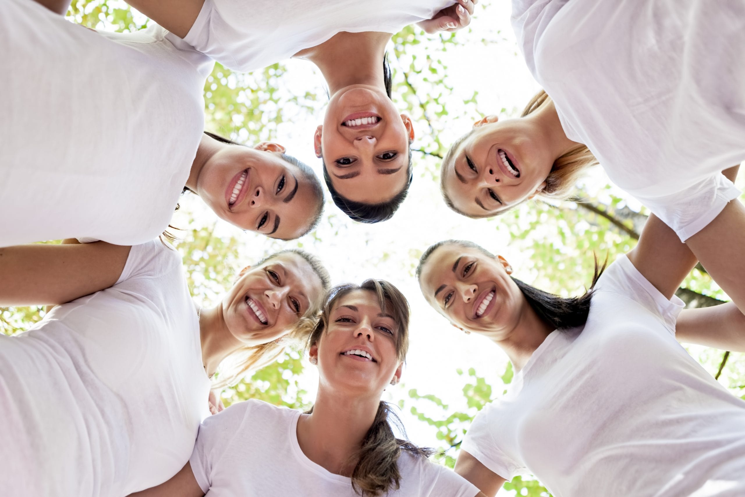 Group,Of,Women,Standing,In,The,Circle,,Smiling,At,The